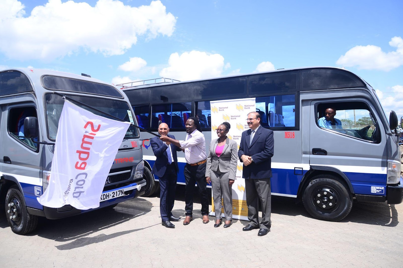 Mehul Sachdev, Pick ups and Buses Product Manager Simba Corp, MetroTrans CEO Oscar Rosanna, Caroline Rutto, Director of Retail, National Bank of Kenya and Naresh Leekha, MD Motors, Simba Corp Ltd flag off a fleet of brand new Fuso buses which handed over to Metro Trans Ltd.
